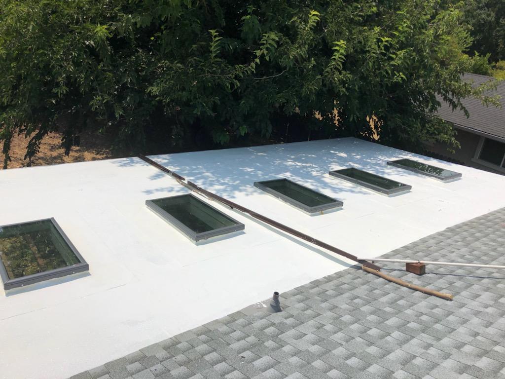 skylight patio roof re-roof comp shingle