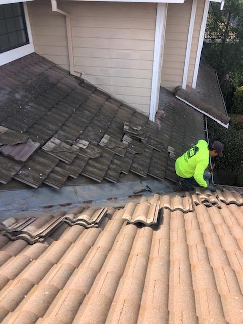 valley cleaning tile roof maintenance
